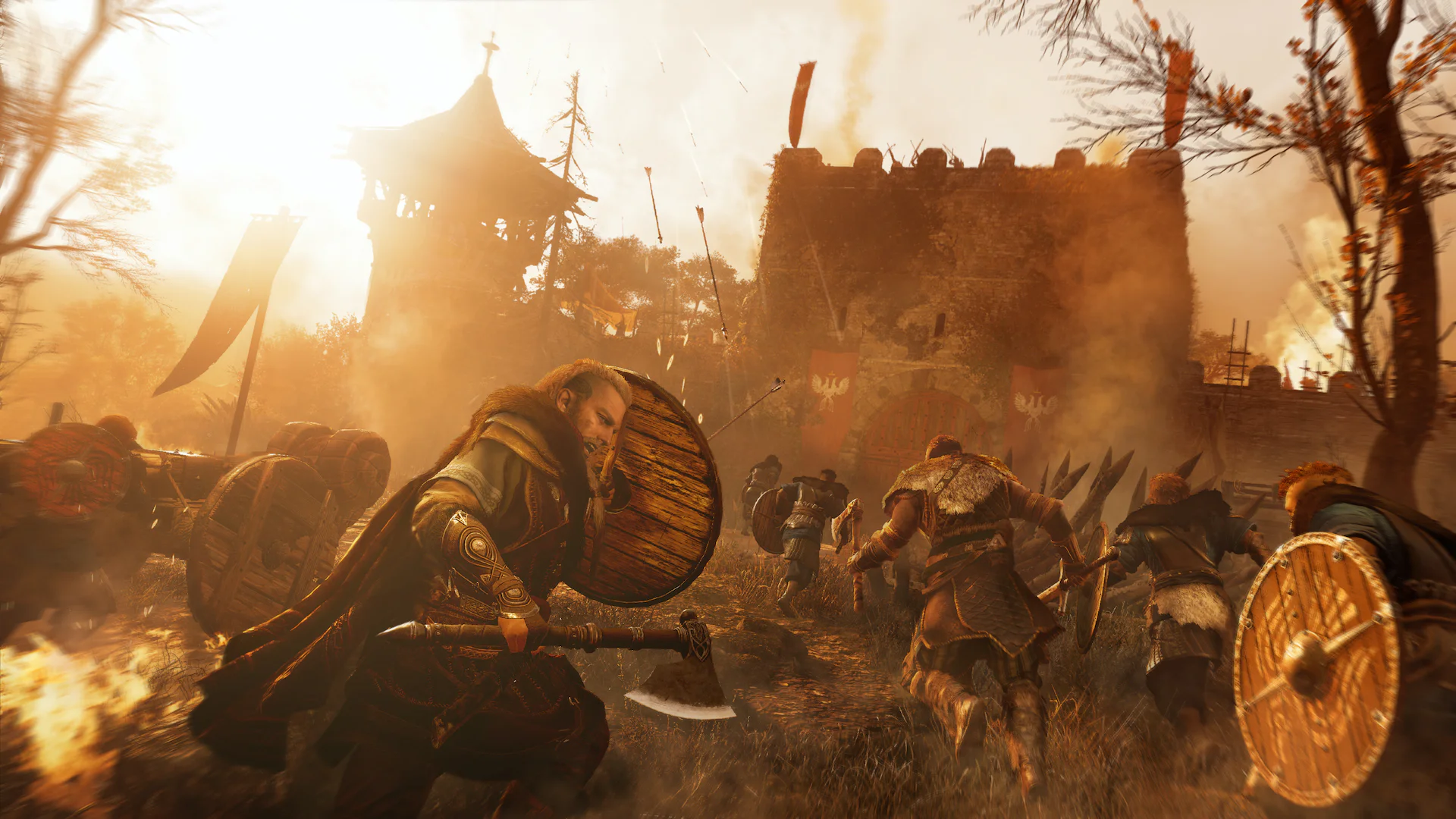 Воины викингов атакуют замок на закате в игре Assassin's Creed Valhalla.
