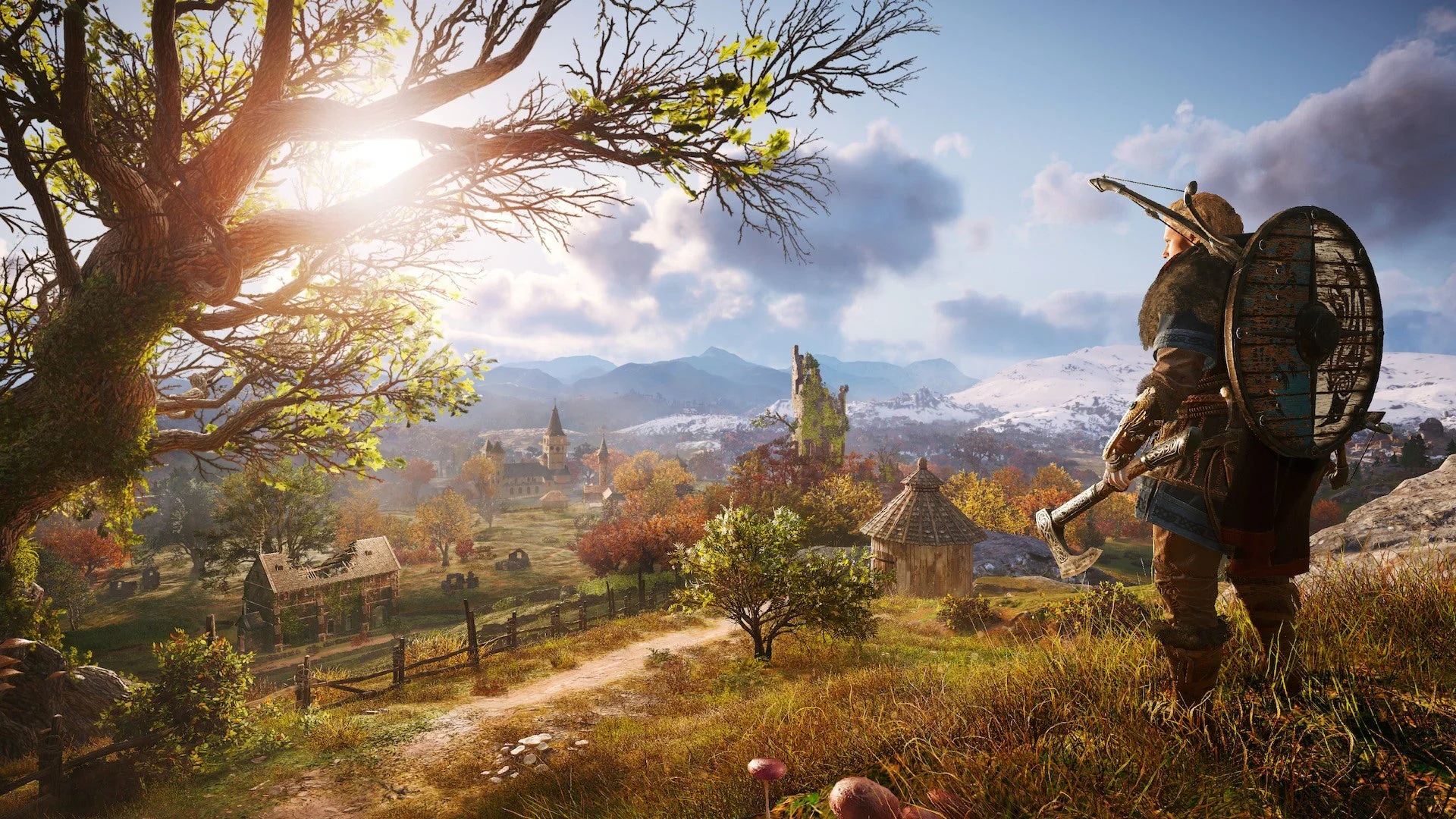 Викинг Эйвор смотрит на живописный пейзаж средневековой Англии в игре Assassin's Creed Valhalla.