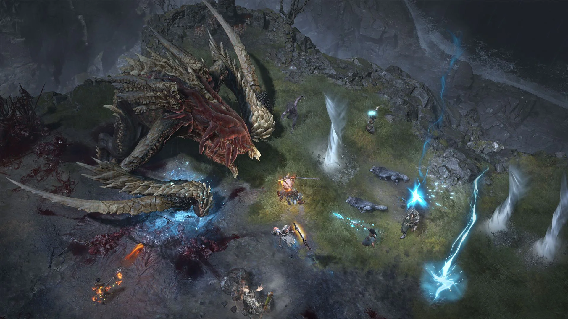 Игроки сражаются с огромным драконом на скалистой местности в Diablo IV