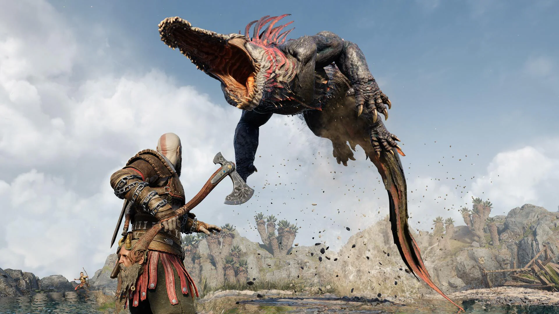 Кратос сражается с огромным монстром в игре God of War Ragnarok