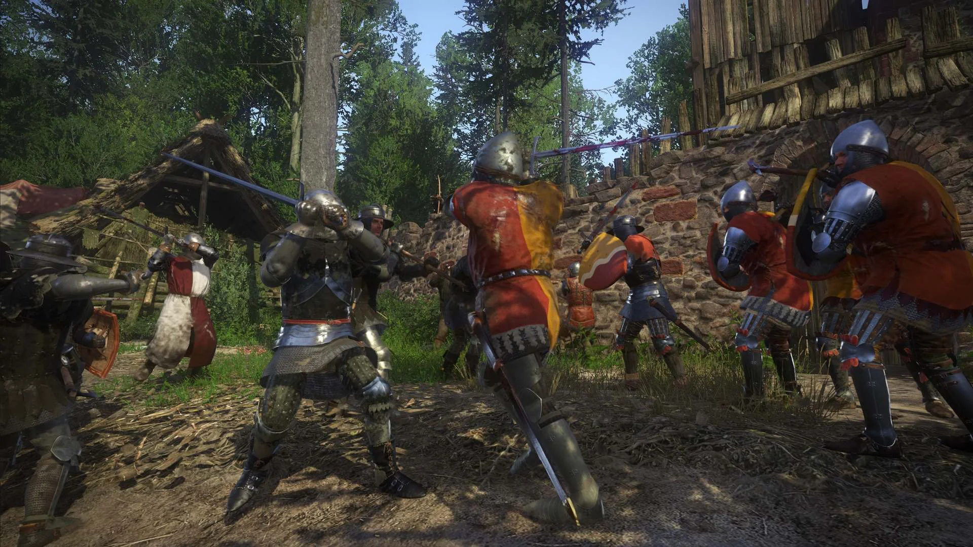 Рыцари в полном вооружении сражаются на фоне леса в игре Kingdom Come Deliverance.