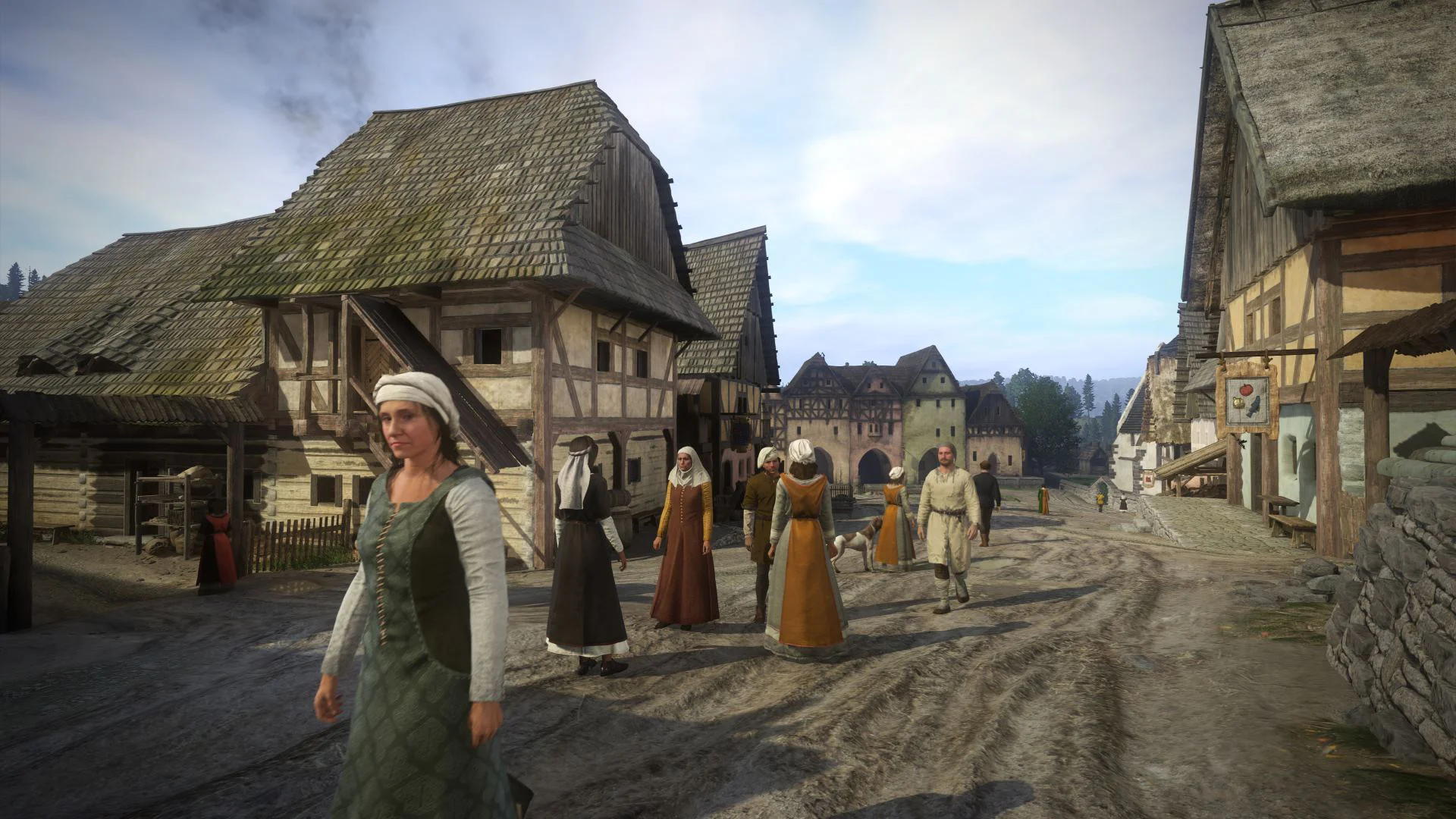 Средневековая деревня с жителями, гуляющими по улице в игре Kingdom Come Deliverance.