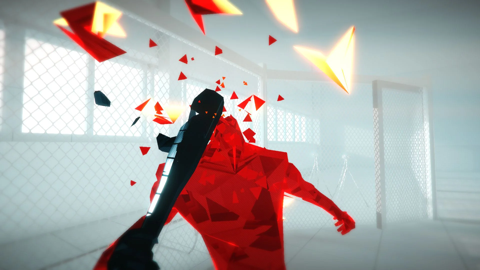 Скриншот из игры SUPERHOT, где главный герой разбивает красного врага дубинкой