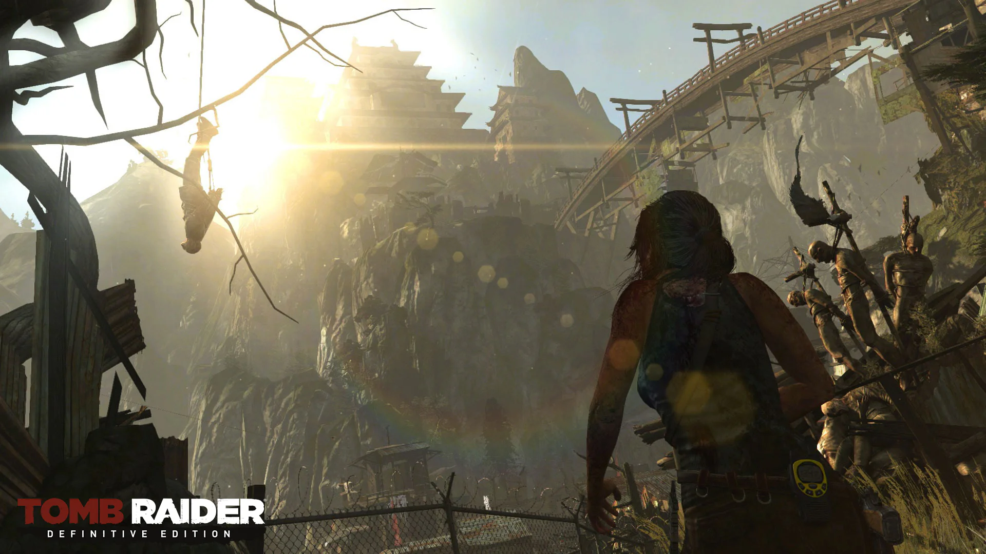 Лара Крофт смотрит на древний храм на острове в лучах заката в Tomb Raider: Definitive Edition.