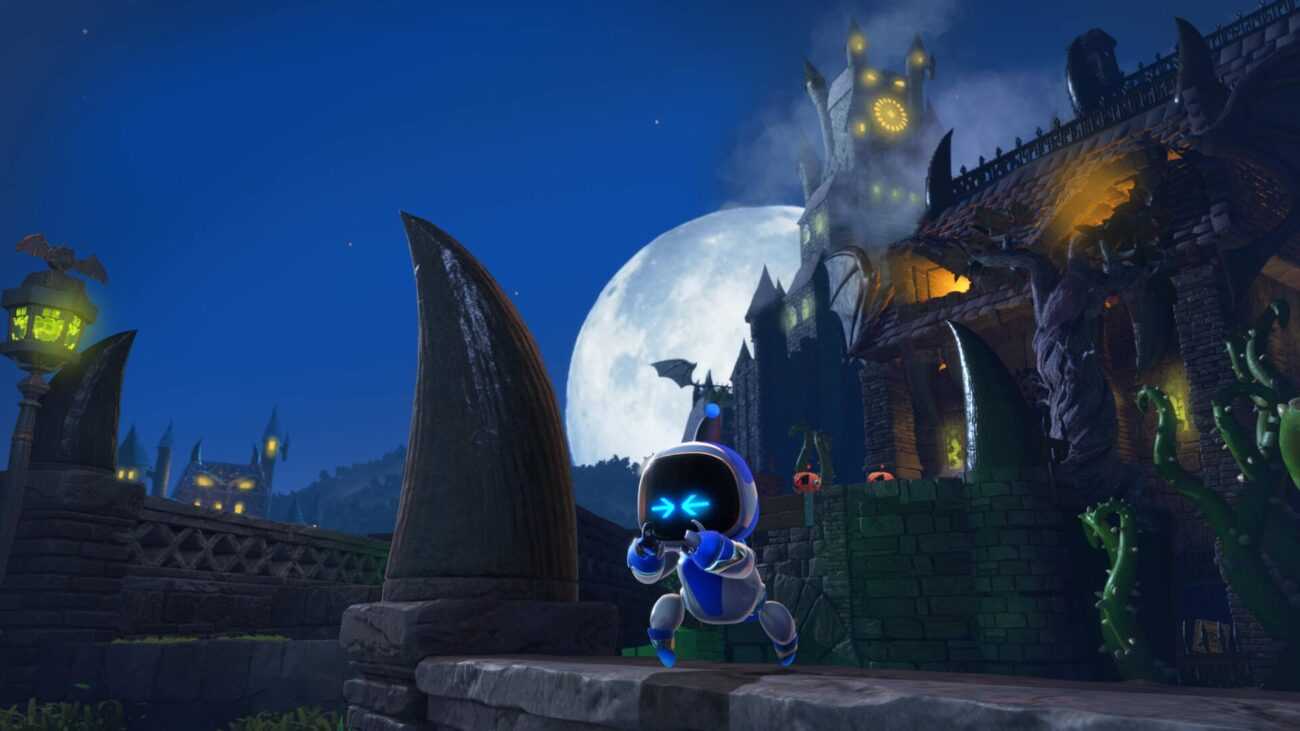 Astro Bot исследует мрачный замок с лунным светом и готической архитектурой в игре на PlayStation 5.