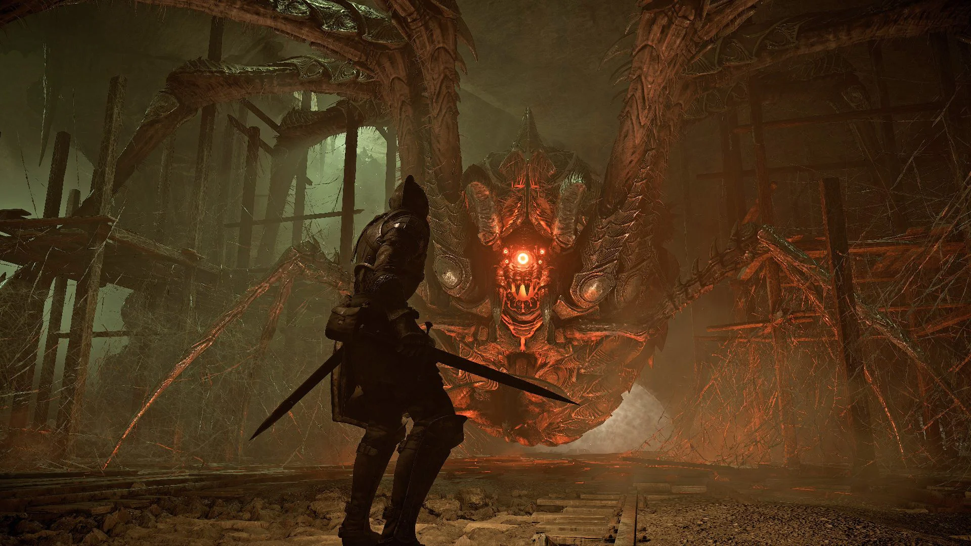 Рыцарь против гигантского паука-босса в Demon’s Souls на PS5
