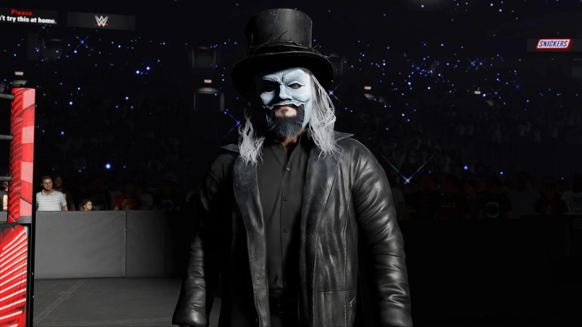 Рестлер в маске и цилиндре на арене WWE