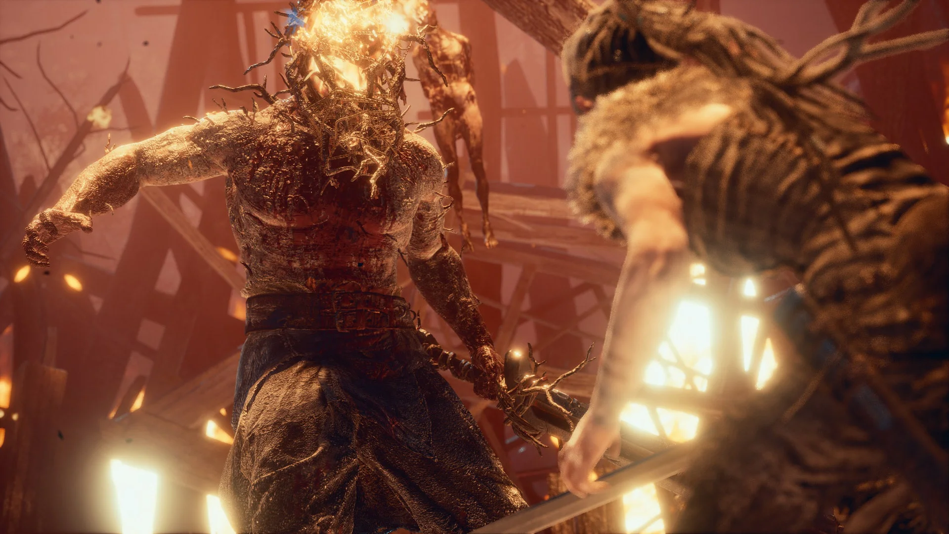 Сенуа сражается с огненным Суртом в Hellblade: Senua’s Sacrifice