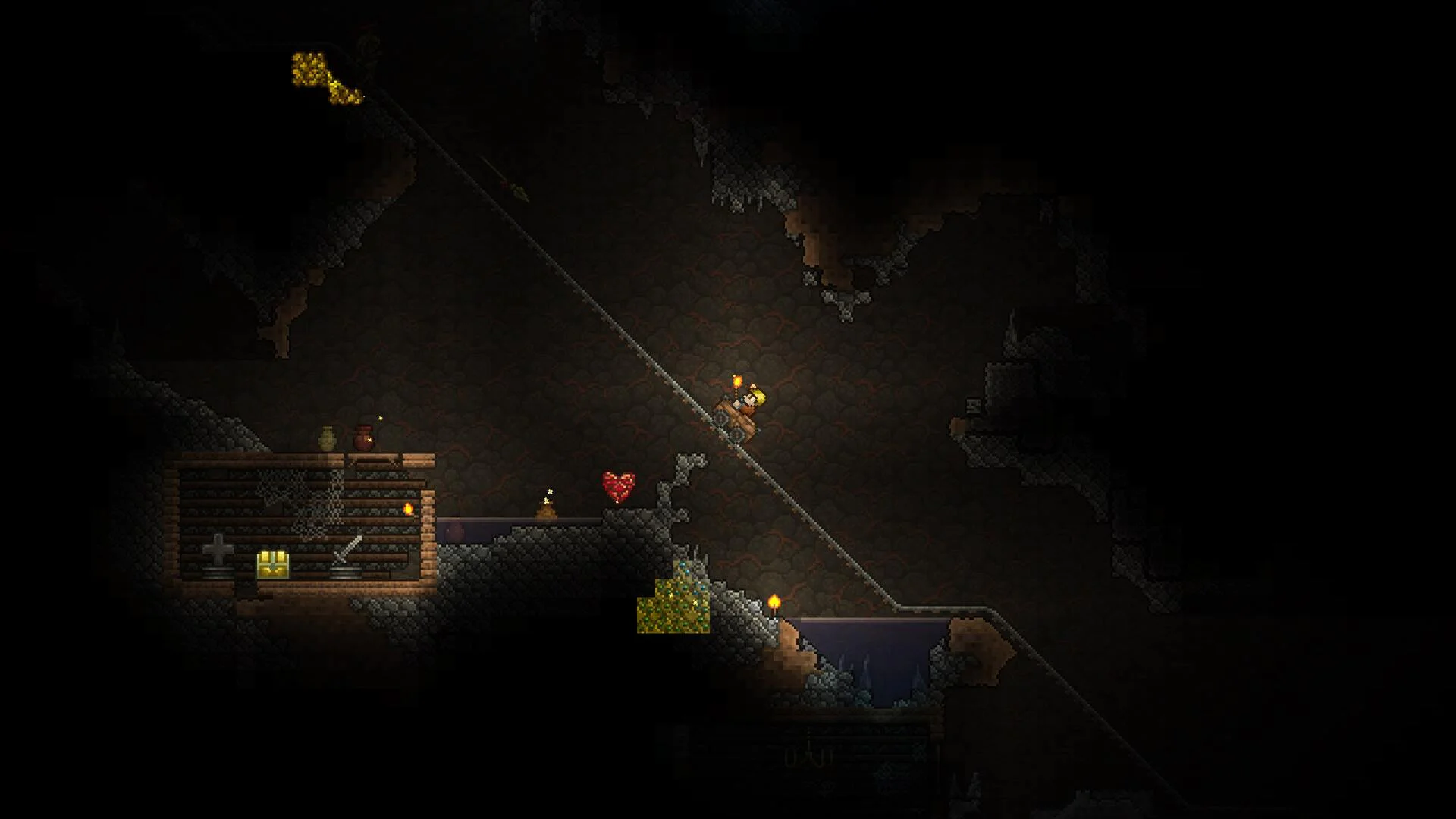 Скриншот Terraria с шахтой и вагонеткой для аренды на PS