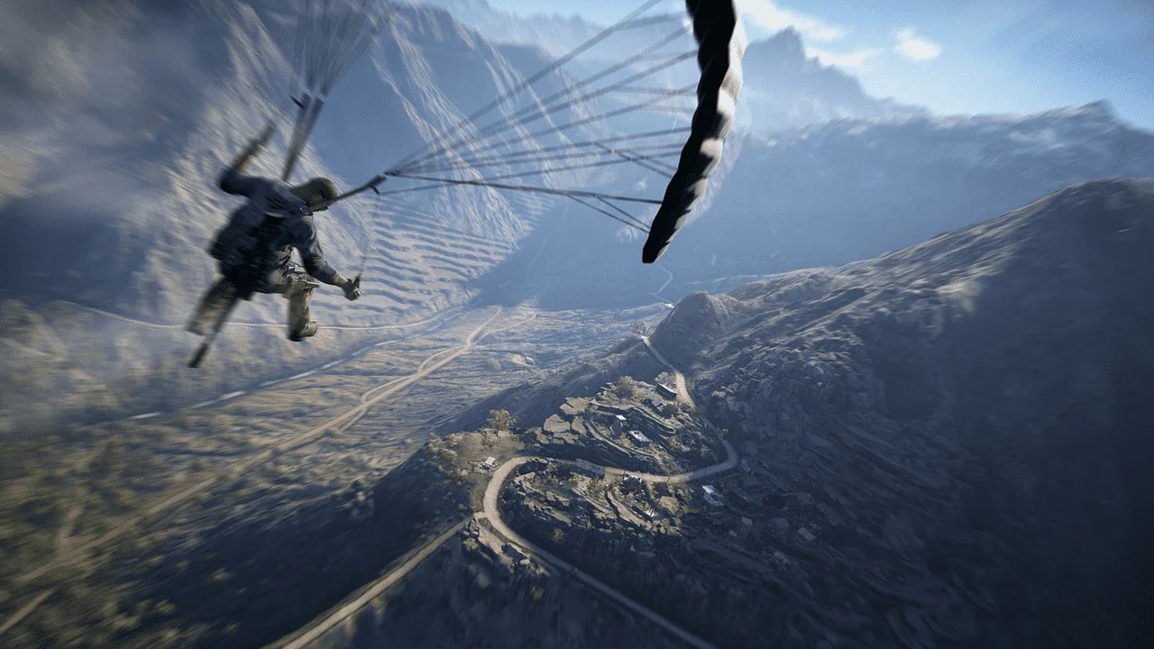 Солдат спускается на парашюте в горах в Ghost Recon Wildlands