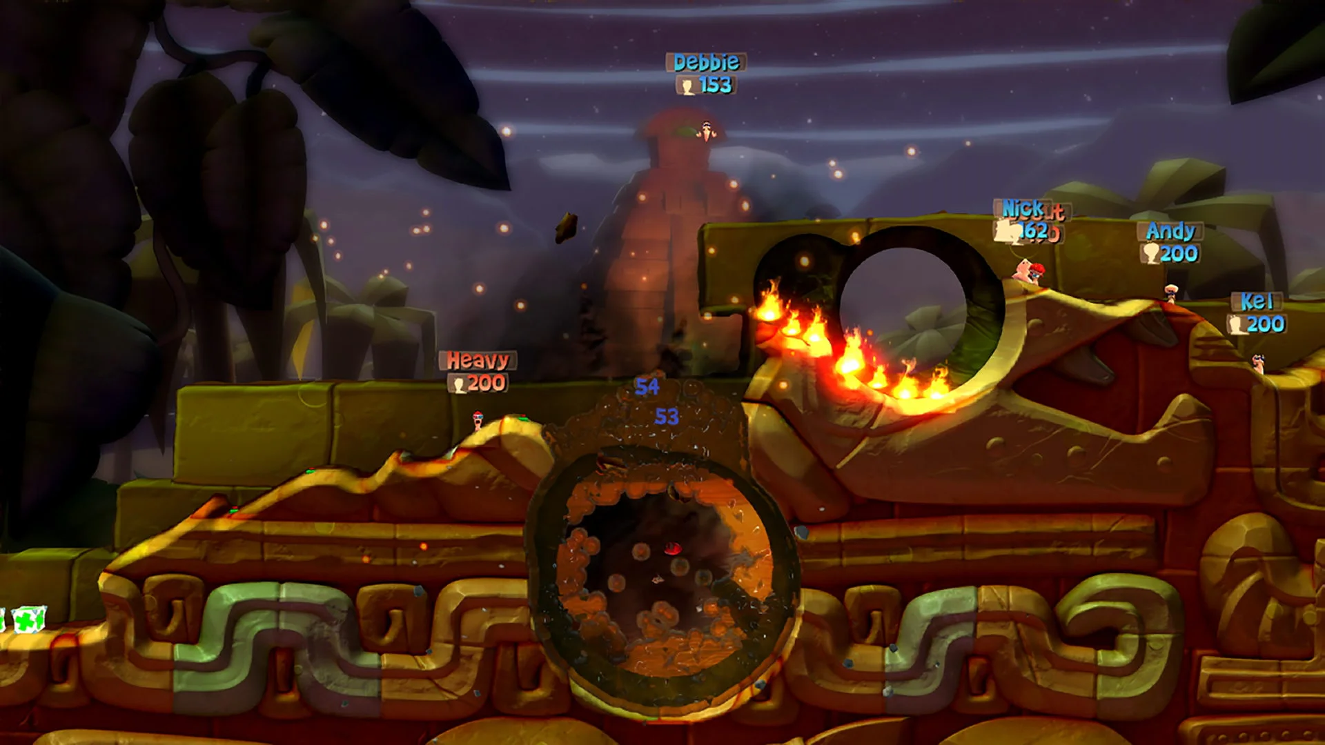 Скриншот Worms Battlegrounds на арене с огнём для аренды на PS